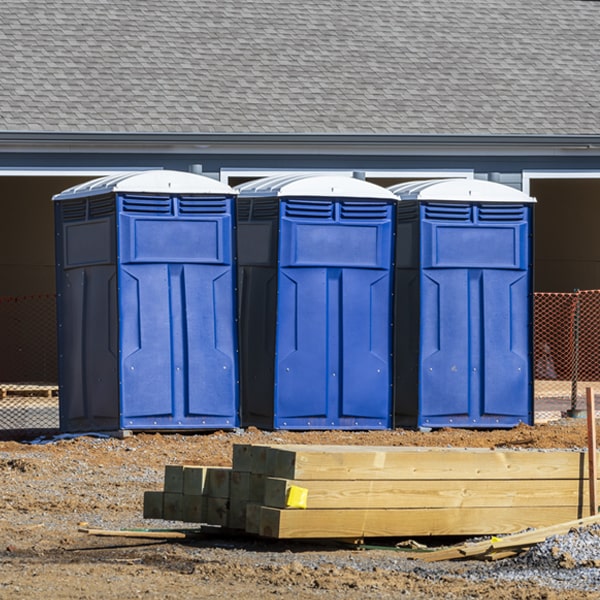 what is the cost difference between standard and deluxe portable restroom rentals in Moosup